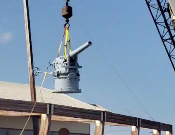 German WWI 88 millimeter cannon is hoisted into place at the Graveyard of the Atlantic Museum. German WWI 88 millimeter cannon is hoisted into place at the Graveyard of the Atlantic Museum.